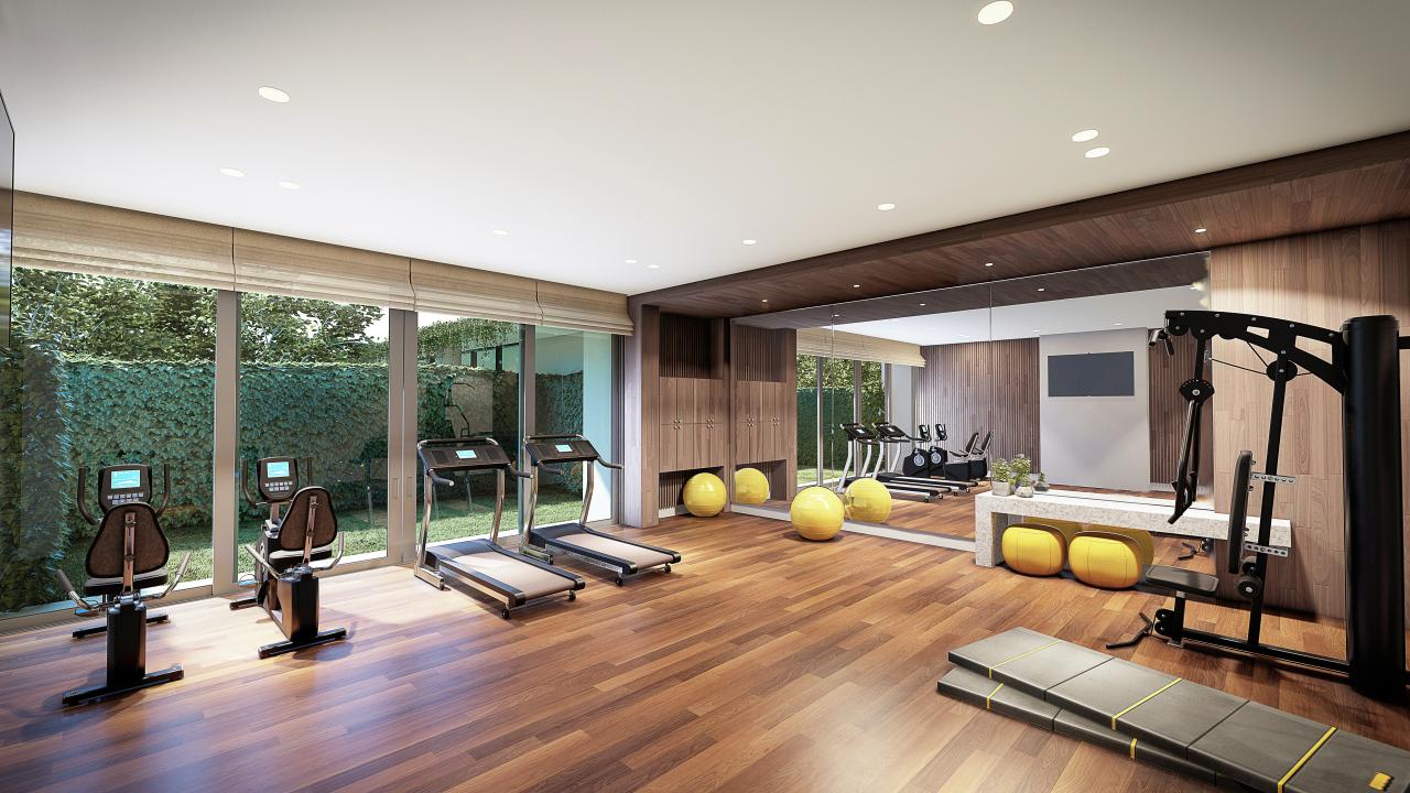gimnasio dotado con zona de yoga y pilates